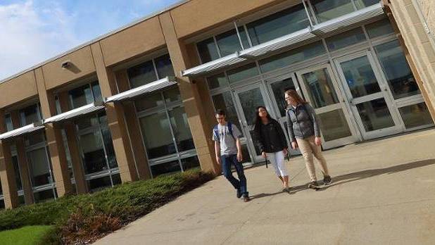 Students Walking outside of health building