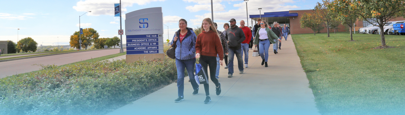 Group of students on campus tour outside the HUB