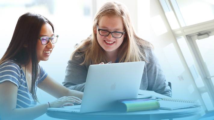 Students studying with laptop