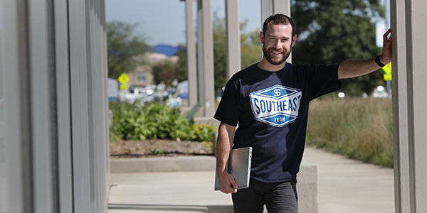 Student outside the HUB