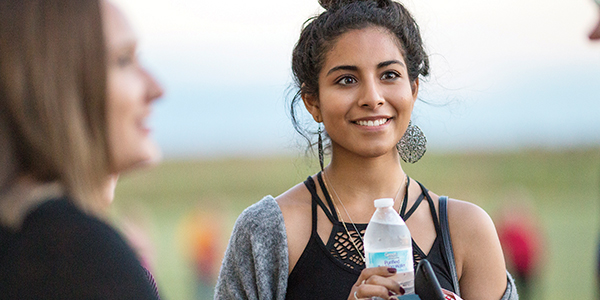 young woman at backyard bash