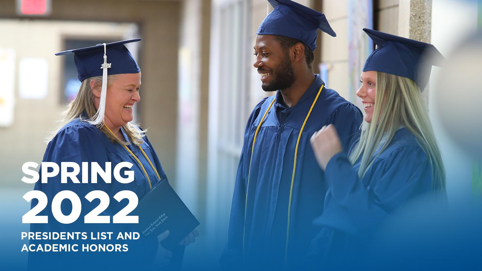 graduates with diplomas