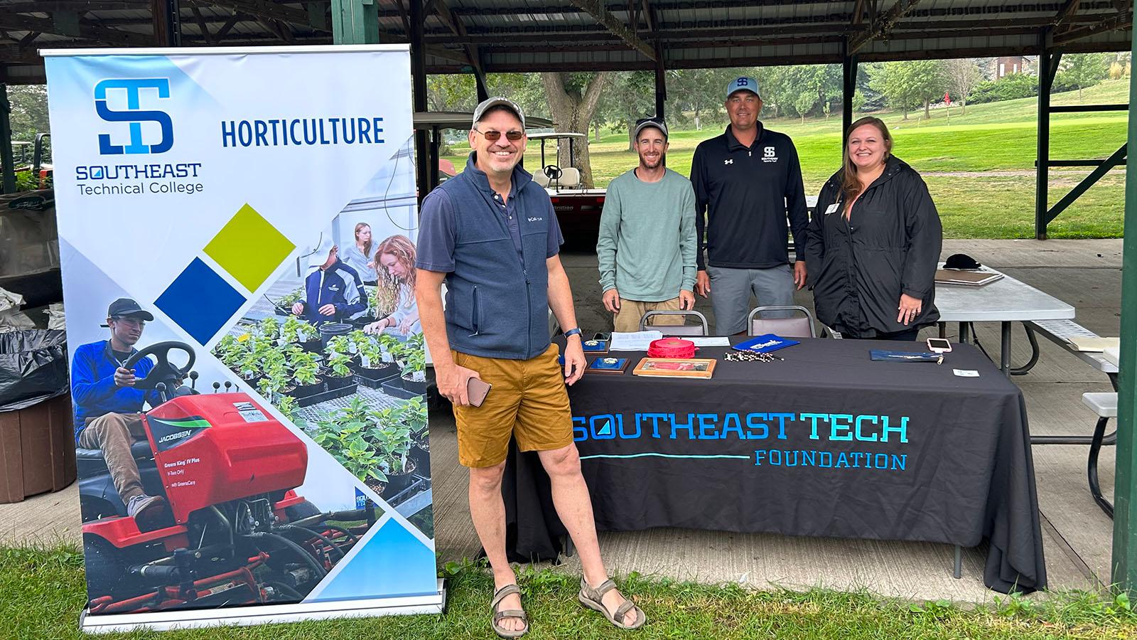 Real Reiter Cup 2023 STC Group at table in picnic shelter