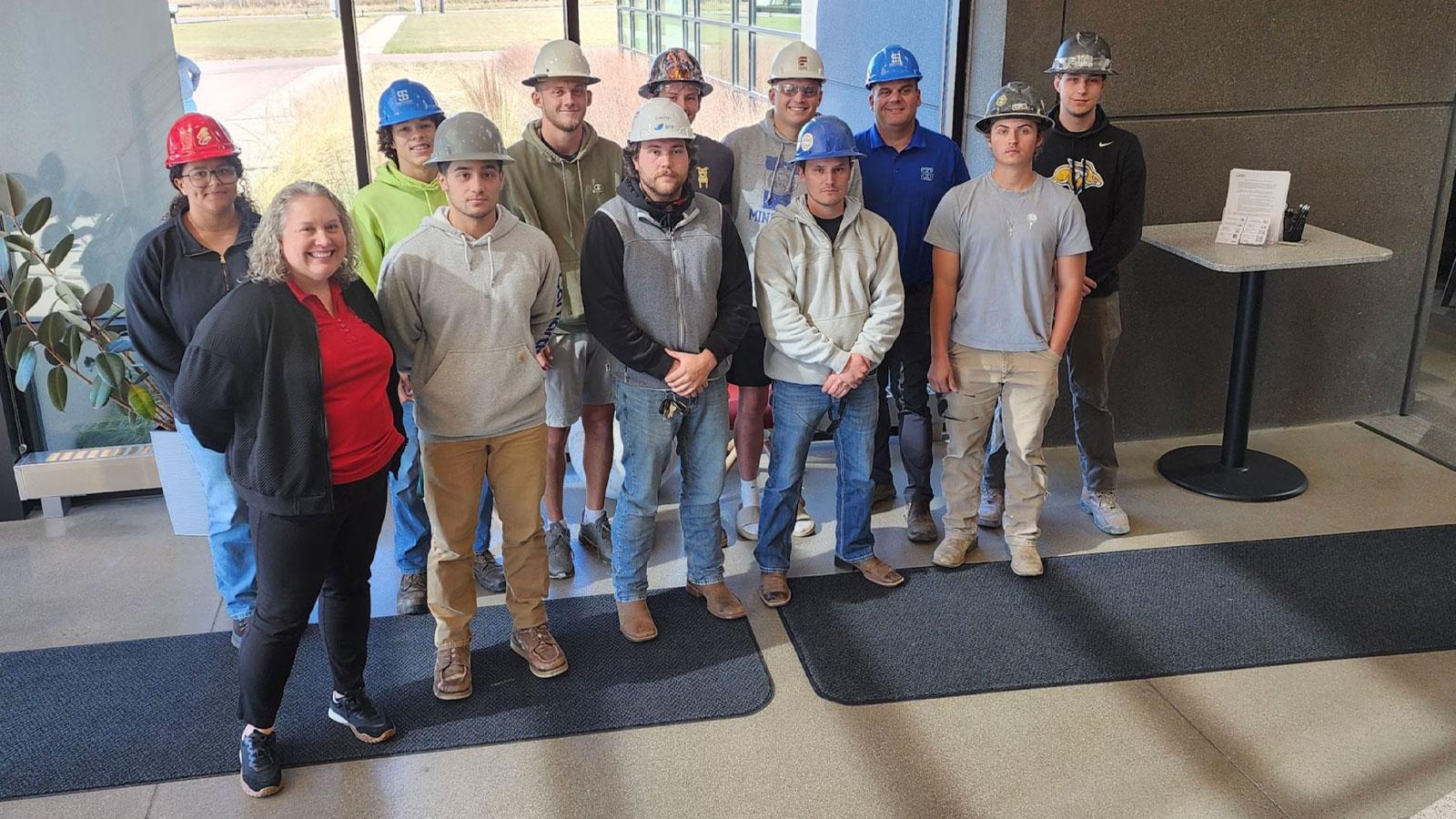 Gage Brothers 2 The Civil Construction class at Southeast Technical College visited Gage Brothers the first week of October to learn about cutting-edge construction techniques. Gage Brothers is a leading construction company in Sioux Falls that works on “building communities and the structures that make up the places people visit, learn, work and play. We manufacture precast concrete that takes on many shapes and forms to structurally support buildings or give them a beautiful exterior facade.” During their visit, the Civil Construction class learned about techniques for forming post and pretensioned concrete, precast construction, bridge beams and columns.