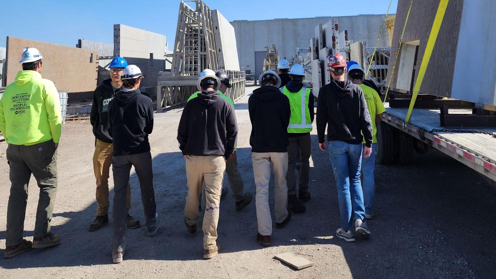 Gage Brothers The Civil Construction class at Southeast Technical College visited Gage Brothers the first week of October to learn about cutting-edge construction techniques. Gage Brothers is a leading construction company in Sioux Falls that works on “building communities and the structures that make up the places people visit, learn, work and play. We manufacture precast concrete that takes on many shapes and forms to structurally support buildings or give them a beautiful exterior facade.” During their visit, the Civil Construction class learned about techniques for forming post and pretensioned concrete, precast construction, bridge beams and columns.