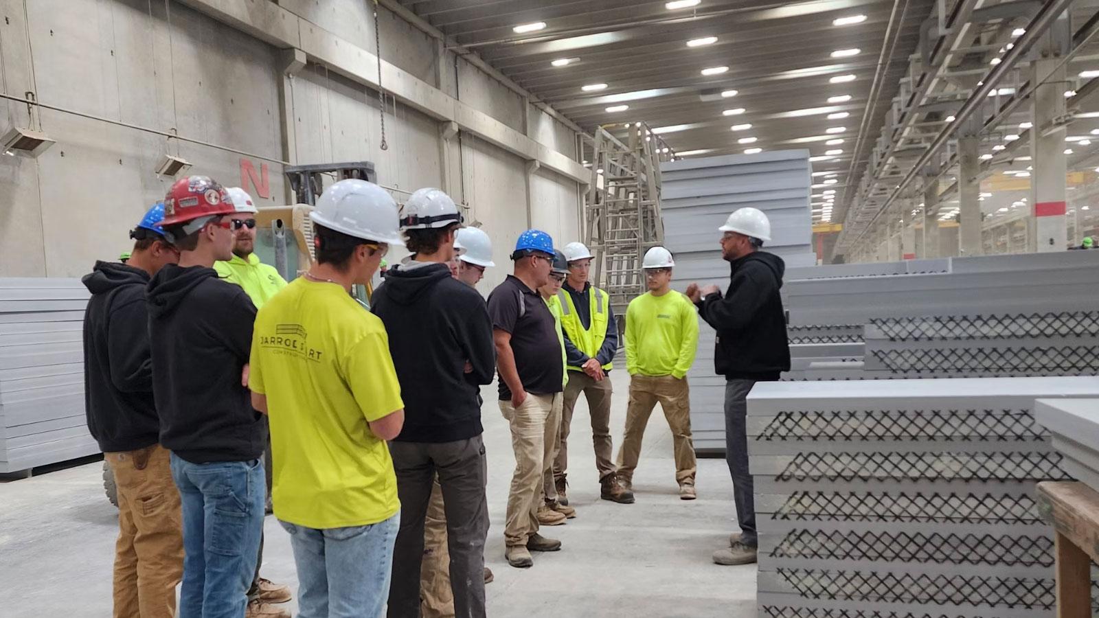 Gage Brothers 5 The Civil Construction class at Southeast Technical College visited Gage Brothers the first week of October to learn about cutting-edge construction techniques. Gage Brothers is a leading construction company in Sioux Falls that works on “building communities and the structures that make up the places people visit, learn, work and play. We manufacture precast concrete that takes on many shapes and forms to structurally support buildings or give them a beautiful exterior facade.” During their visit, the Civil Construction class learned about techniques for forming post and pretensioned concrete, precast construction, bridge beams and columns.