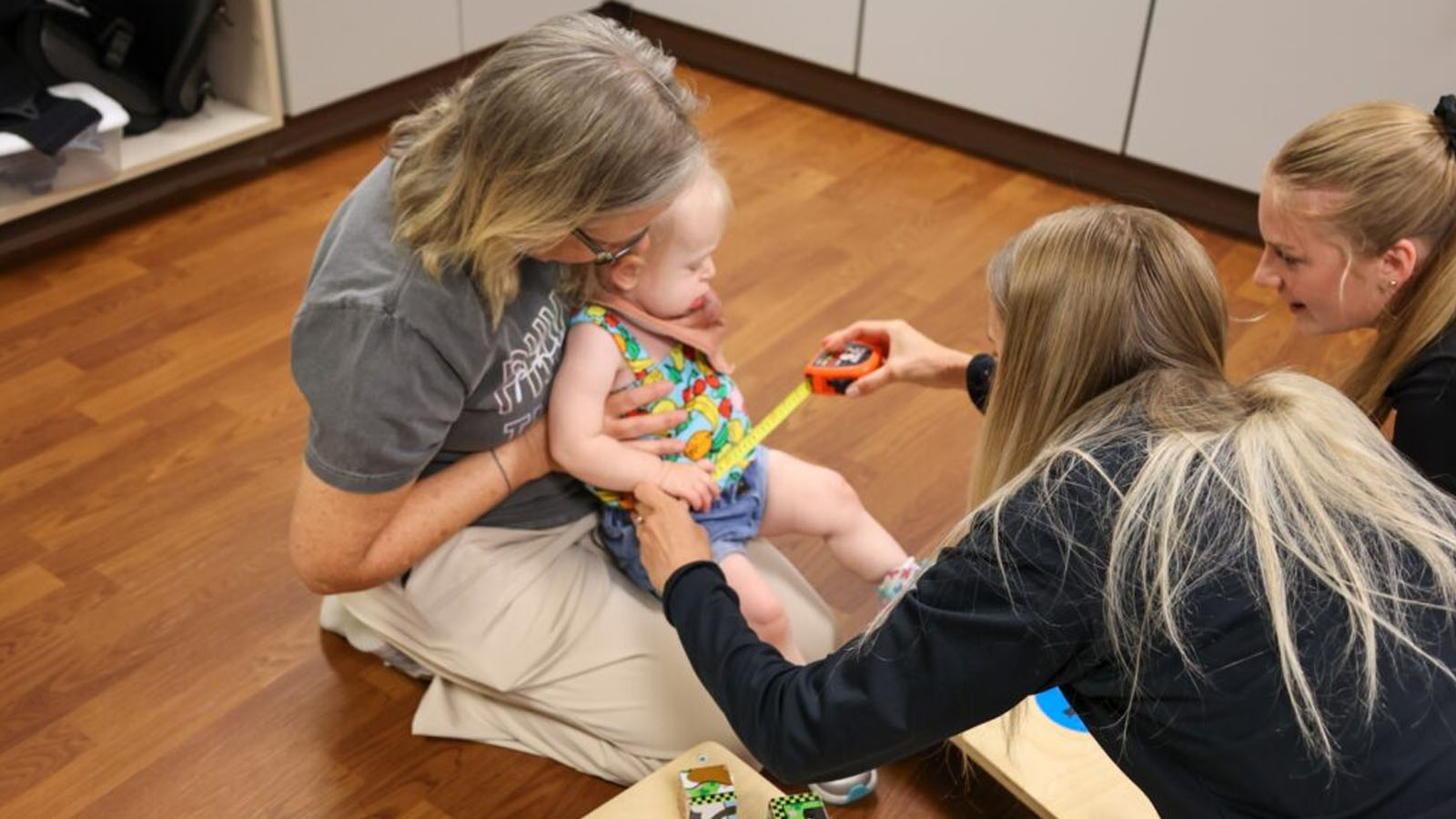 Physical Therapy students work with identifying key measurements for each child