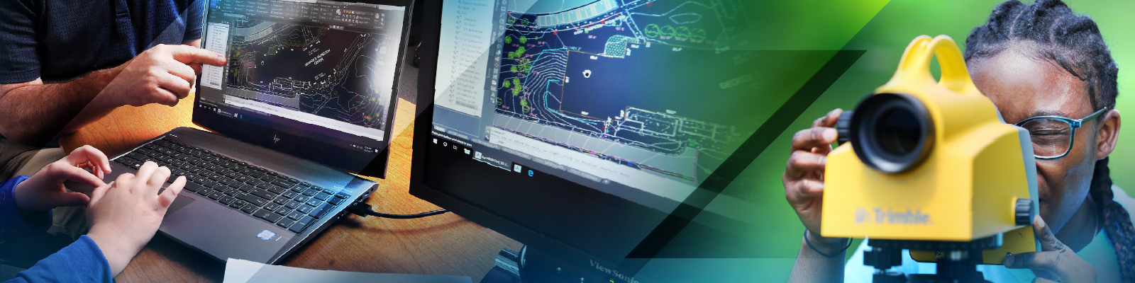 Student reviewing CAD drawings on computer screen while another student is looking surveying land.