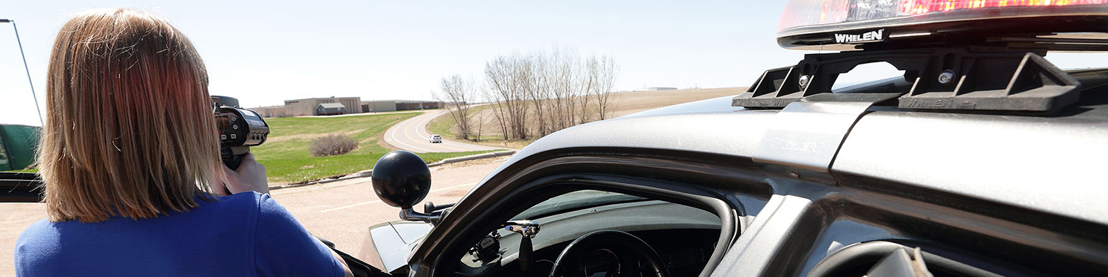 Female Law Enforcement Student taking radar