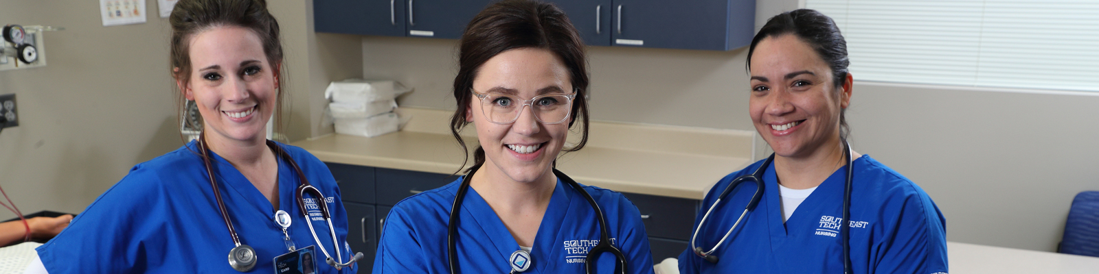 portrait of young student with stethoscope in exam room