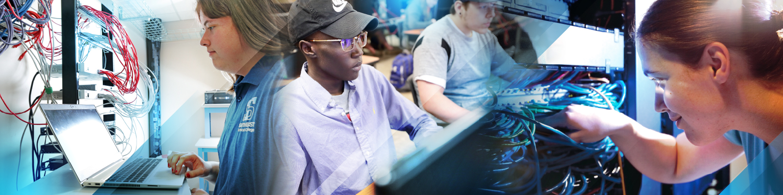 Student adjusting networking wires while other students are learning and practicing administrating the correct I.T. credentials to the network.