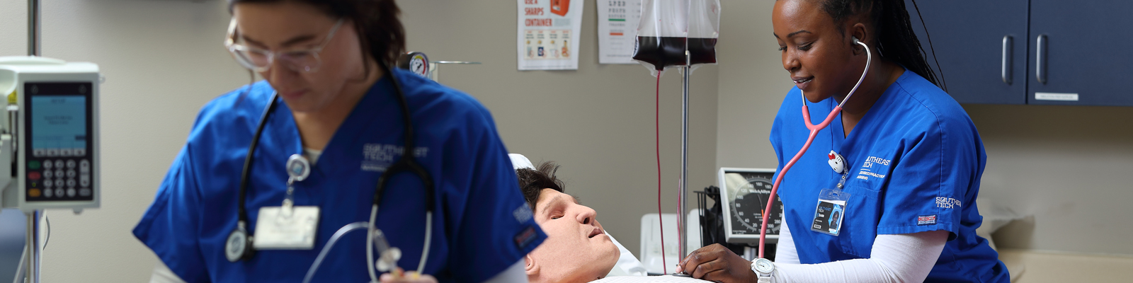 Nursing student in hospital room with stethoscope and watch