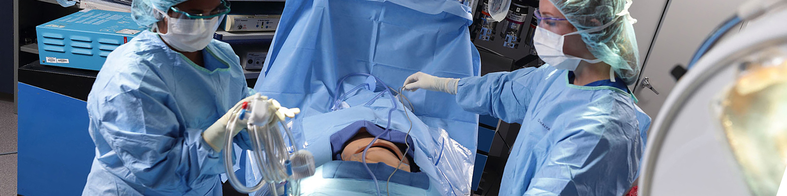 Southeast Tech students in an operating room lab, performing mock surgery.