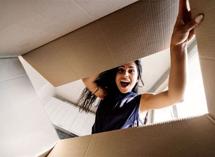 Girl opening box