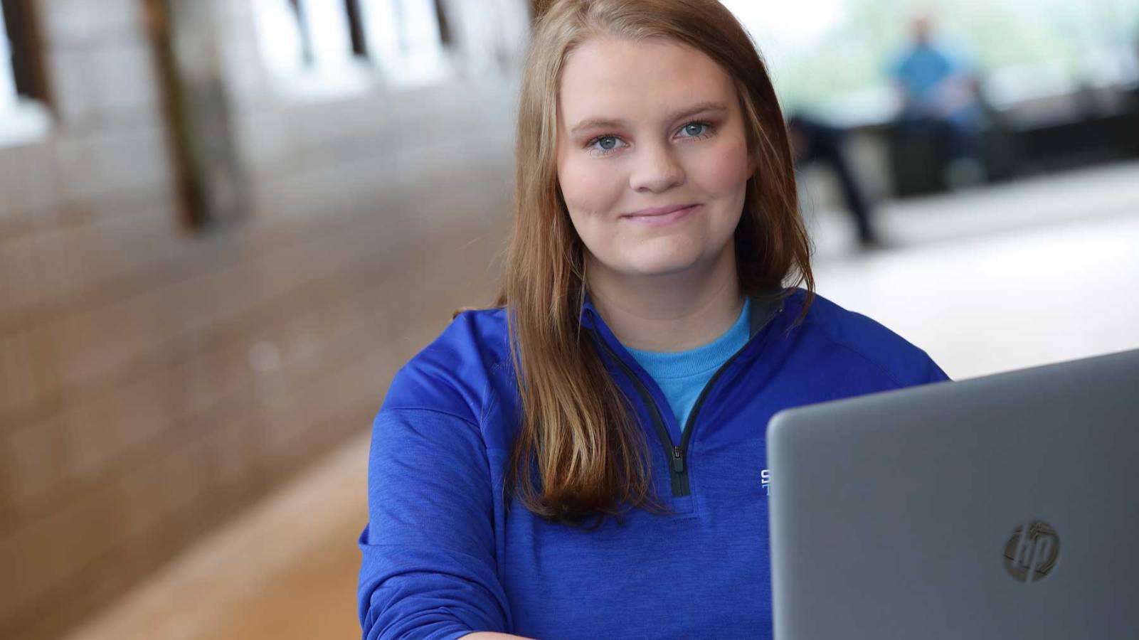 Virtual Visit Day young female student with laptop