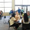 Students enjoy pizza in Mickelson Center commons. 