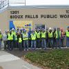 Construction Management Student Organization group photo outside Sioux Falls Public Works Building.