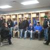 GCSAA students in Minnesota Twins locker room.