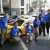 GCSAA students with sports car. 