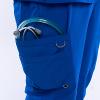 Pants pocket view of Cherokee Infinity scrubs in royal blue with sizes XXS-5XL available.