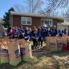 STC students, staff and faculty volunteers participate in the Rake the Town event. 