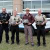 Graphics on a Ford Explorer utilized by the Law Enforcement program recognize the agency that provided them. 