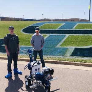 Jesse Tschetter and classmate, Ryan DeGreeff, stayed after class to complete the STC logo.