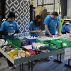 Business students at STC employees volunteer at the Habitat for Humanity ReStore facility.