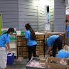Business students at STC employees volunteer at the Habitat for Humanity ReStore facility.
