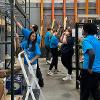 Business students at STC employees volunteer at the Habitat for Humanity ReStore facility.