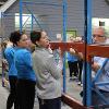 Business students at STC employees volunteer at the Habitat for Humanity ReStore facility.