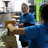 Business students at STC employees volunteer at the Habitat for Humanity ReStore facility.