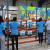 Business students at STC employees volunteer at the Habitat for Humanity ReStore facility.