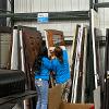 Business students at STC employees volunteer at the Habitat for Humanity ReStore facility.
