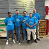 Business students at STC employees volunteer at the Habitat for Humanity ReStore facility.