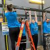 Business students at STC employees volunteer at the Habitat for Humanity ReStore facility.